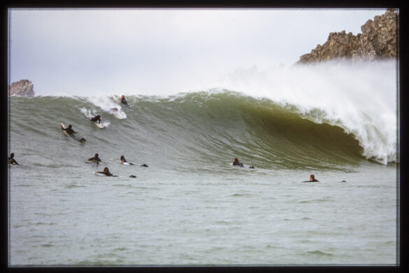 The pack of chargers during a solid ground swell at Karitane Reef in 1999. Photo: Derek Morrison