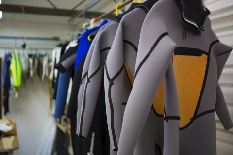 Racks of new suits waiting for dispatch. Photo: Derek Morrison