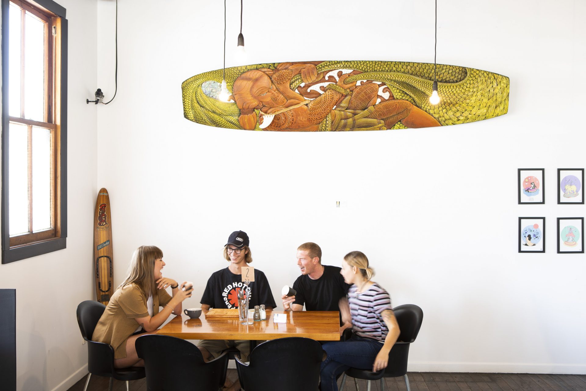An original piece by Aaron Kereopa sits on the wall at Raglan Roast, Raglan, New Zealand. Photo: Derek Morrison