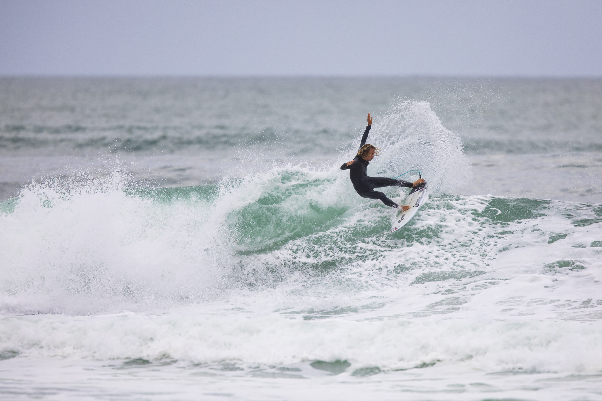 Caleb Cutmore unleashes during a freesurfing session. Photo: Derek Morrison