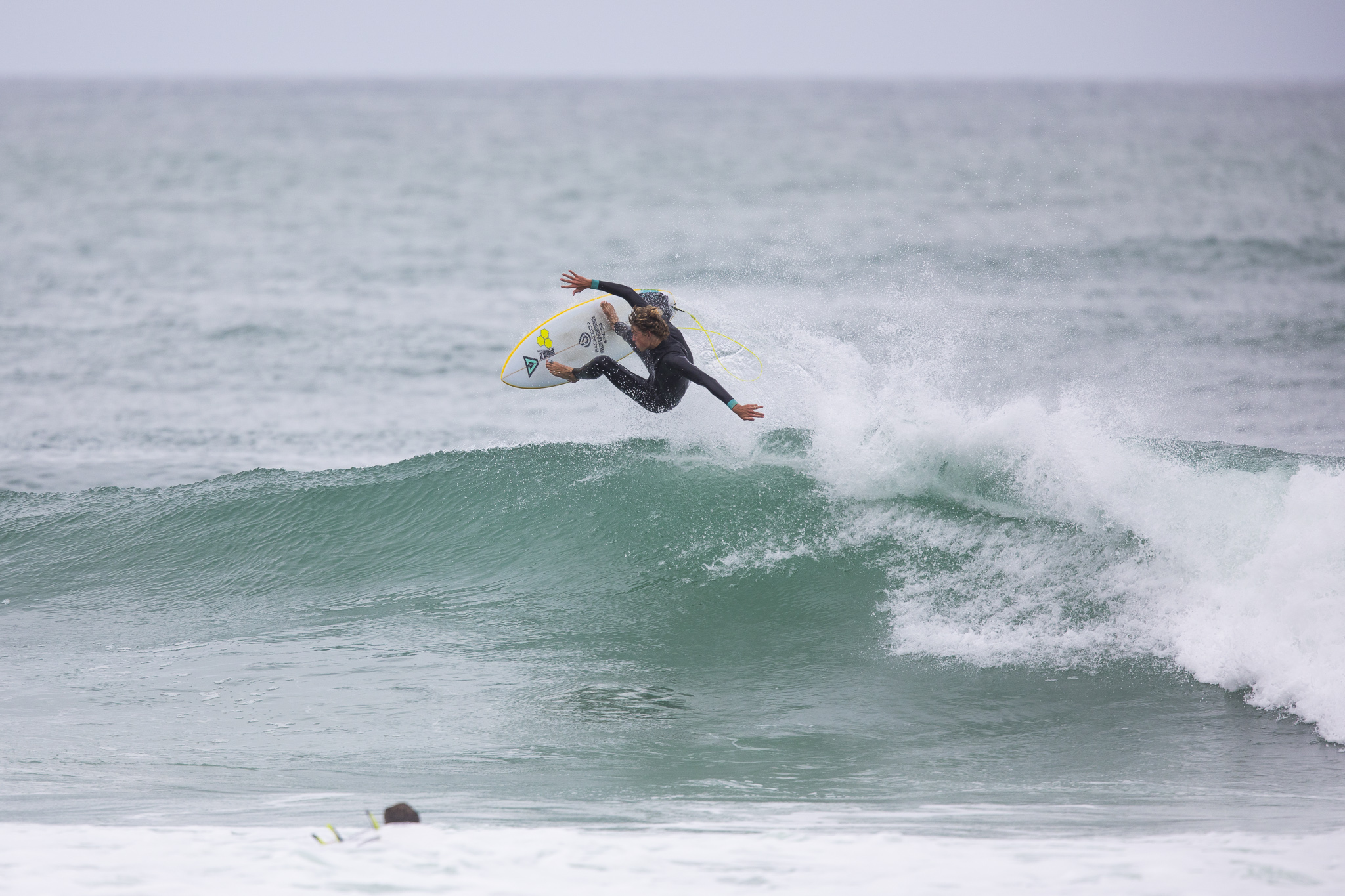 Taylor Hutchison takes to the airduring a freesurfing session. Photo: Derek Morrison