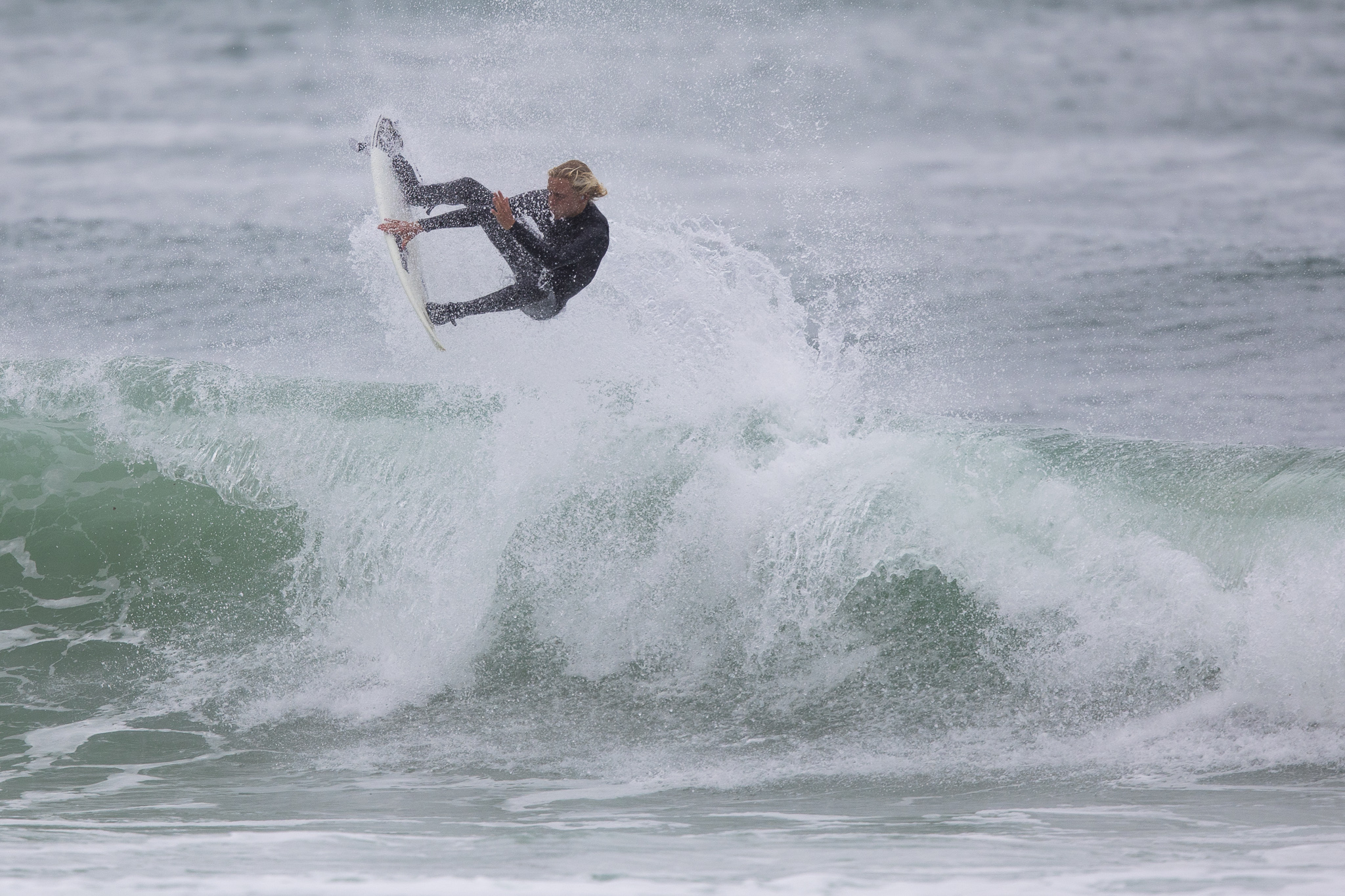 Jack Lee in flight during a freesurfing session.
Photo: Derek Morrison