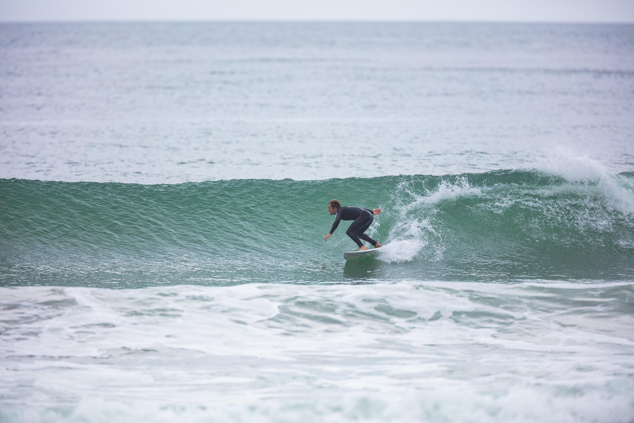 Olympic athlete Billy Stairmand trains during a clean swell at a beach near Brighton, Dunedin, New Zealand.