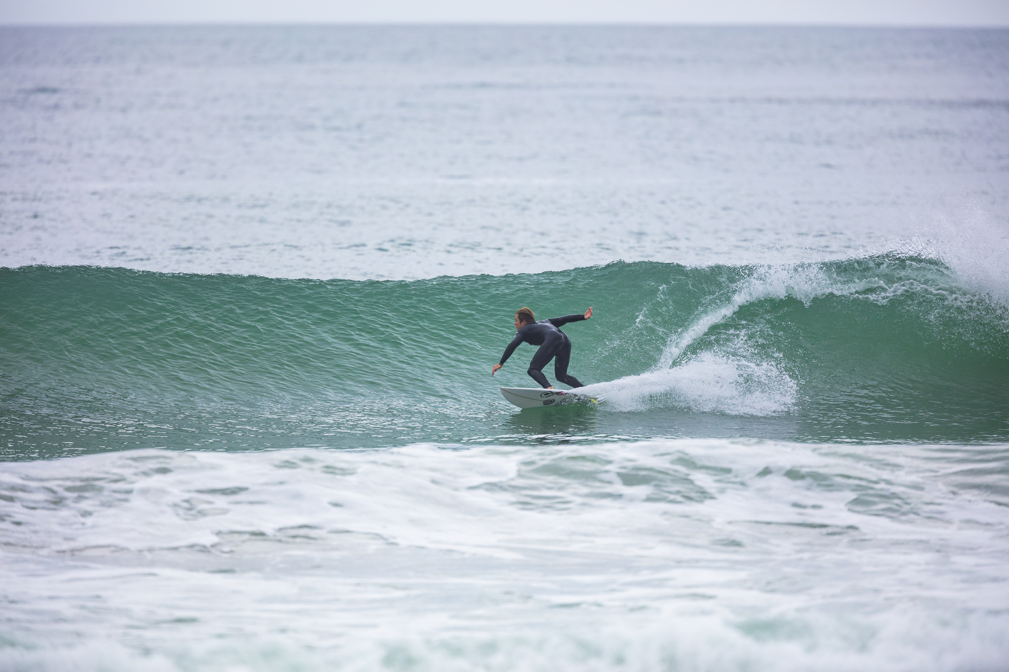 Olympic athlete Billy Stairmand trains during a clean swell at a beach near Brighton, Dunedin, New Zealand.