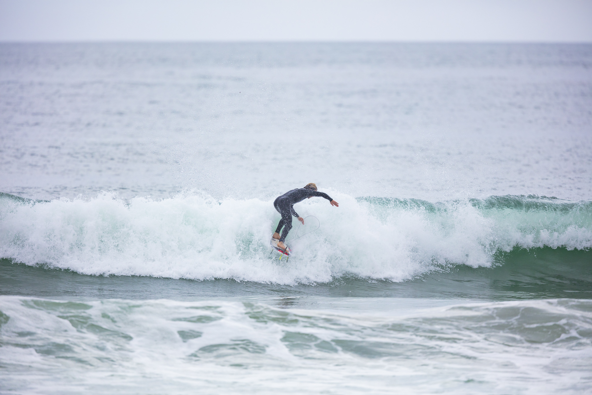 Olympic athlete Billy Stairmand trains during a clean swell at a beach near Brighton, Dunedin, New Zealand.