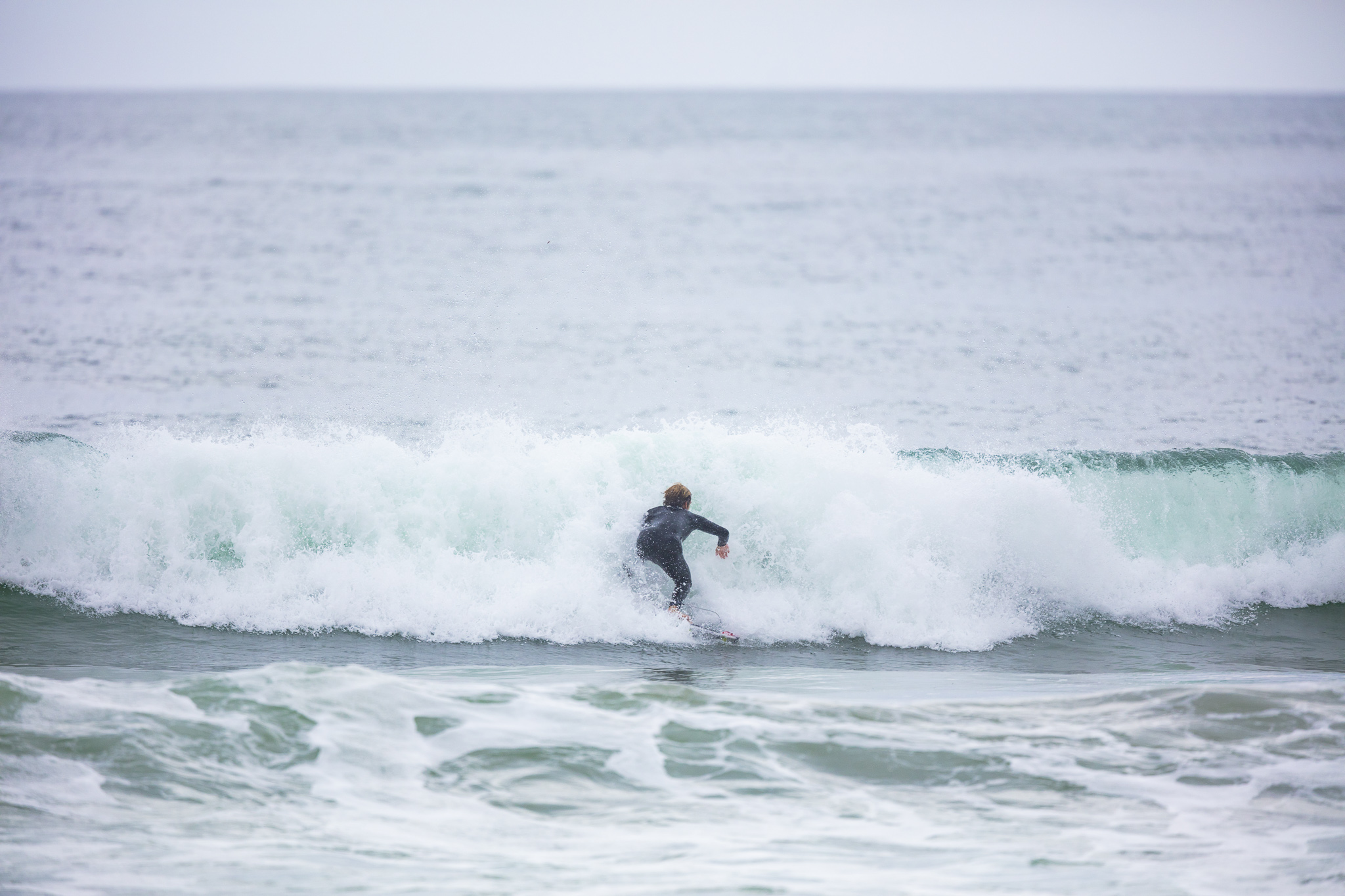 Olympic athlete Billy Stairmand trains during a clean swell at a beach near Brighton, Dunedin, New Zealand.