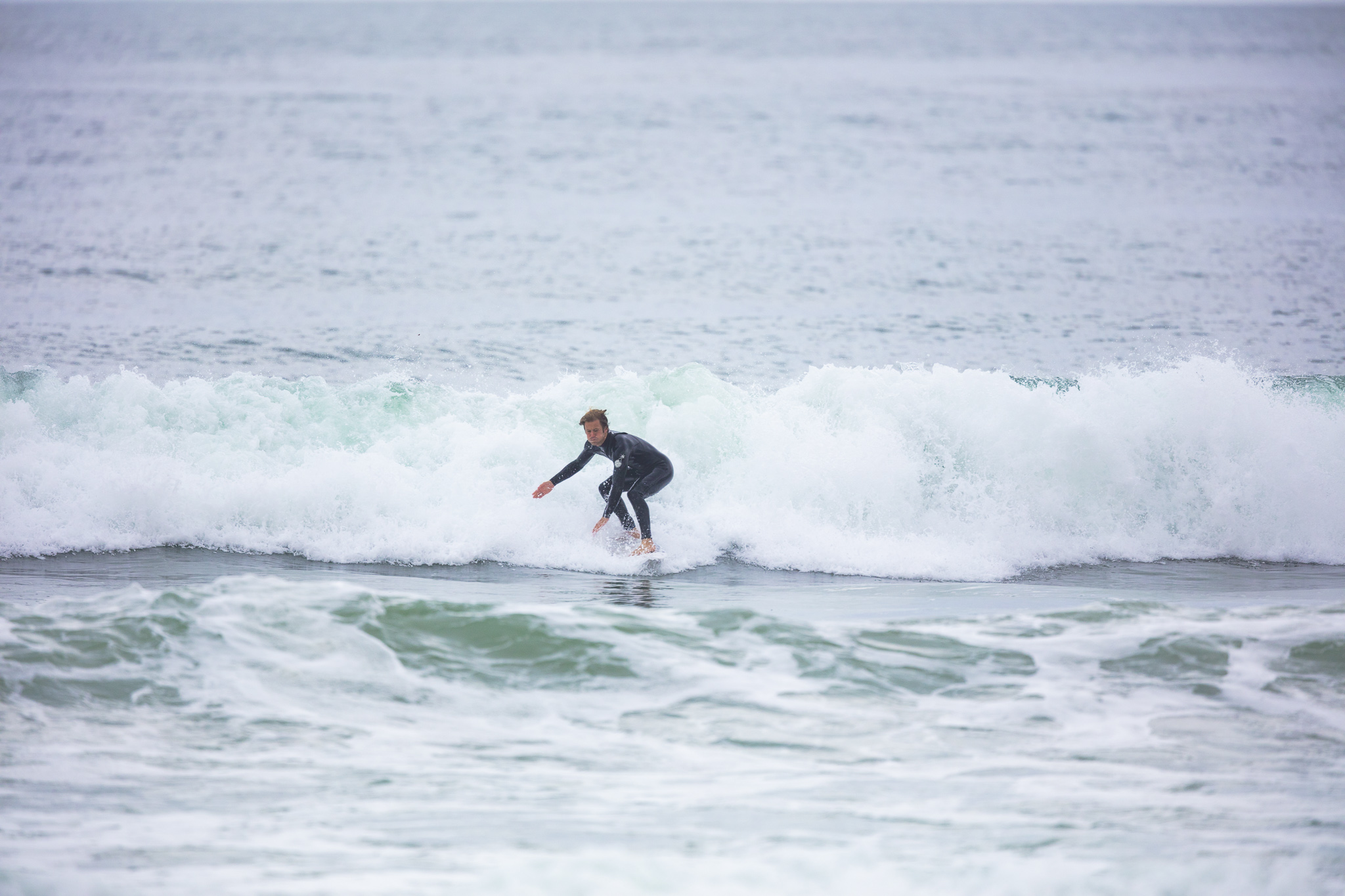 Olympic athlete Billy Stairmand trains during a clean swell at a beach near Brighton, Dunedin, New Zealand.