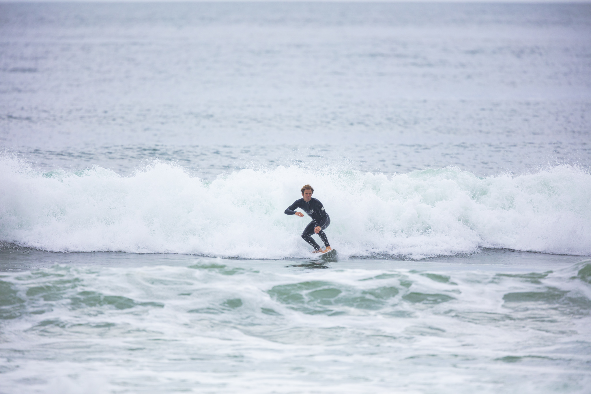 Olympic athlete Billy Stairmand trains during a clean swell at a beach near Brighton, Dunedin, New Zealand.