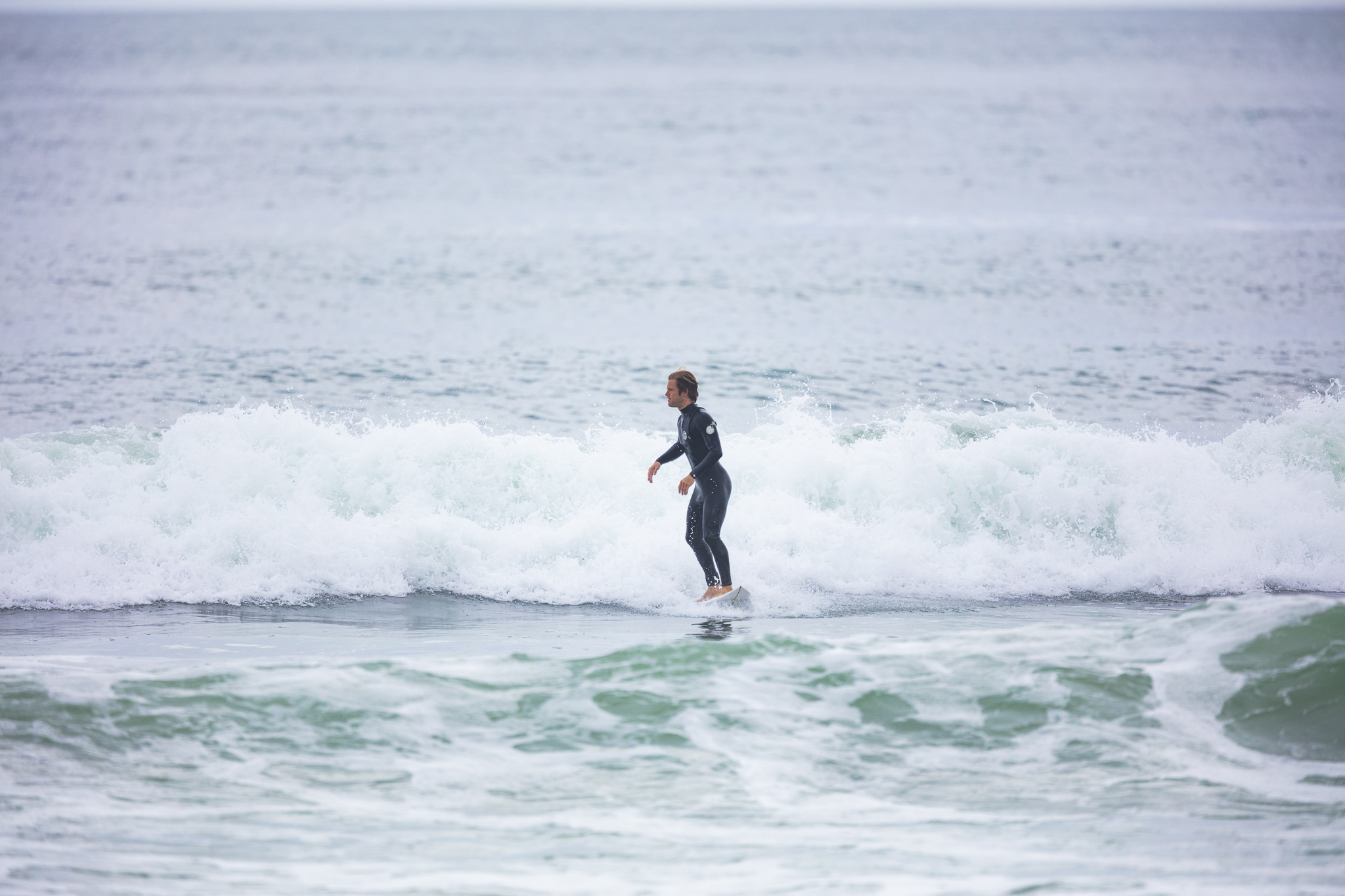 Olympic athlete Billy Stairmand trains during a clean swell at a beach near Brighton, Dunedin, New Zealand.