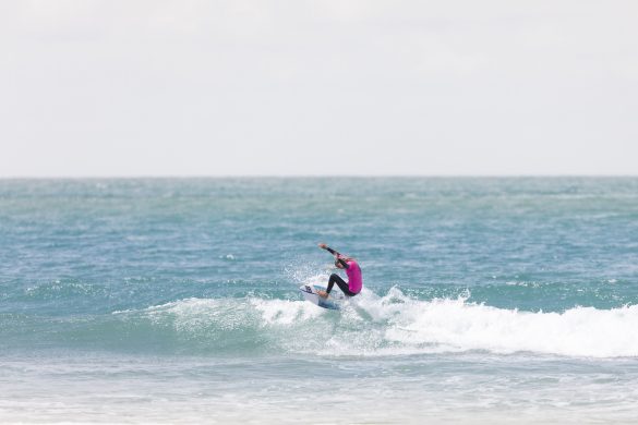 Ava Henderson making the most of the dying swell to win the Under 18 girls' final.